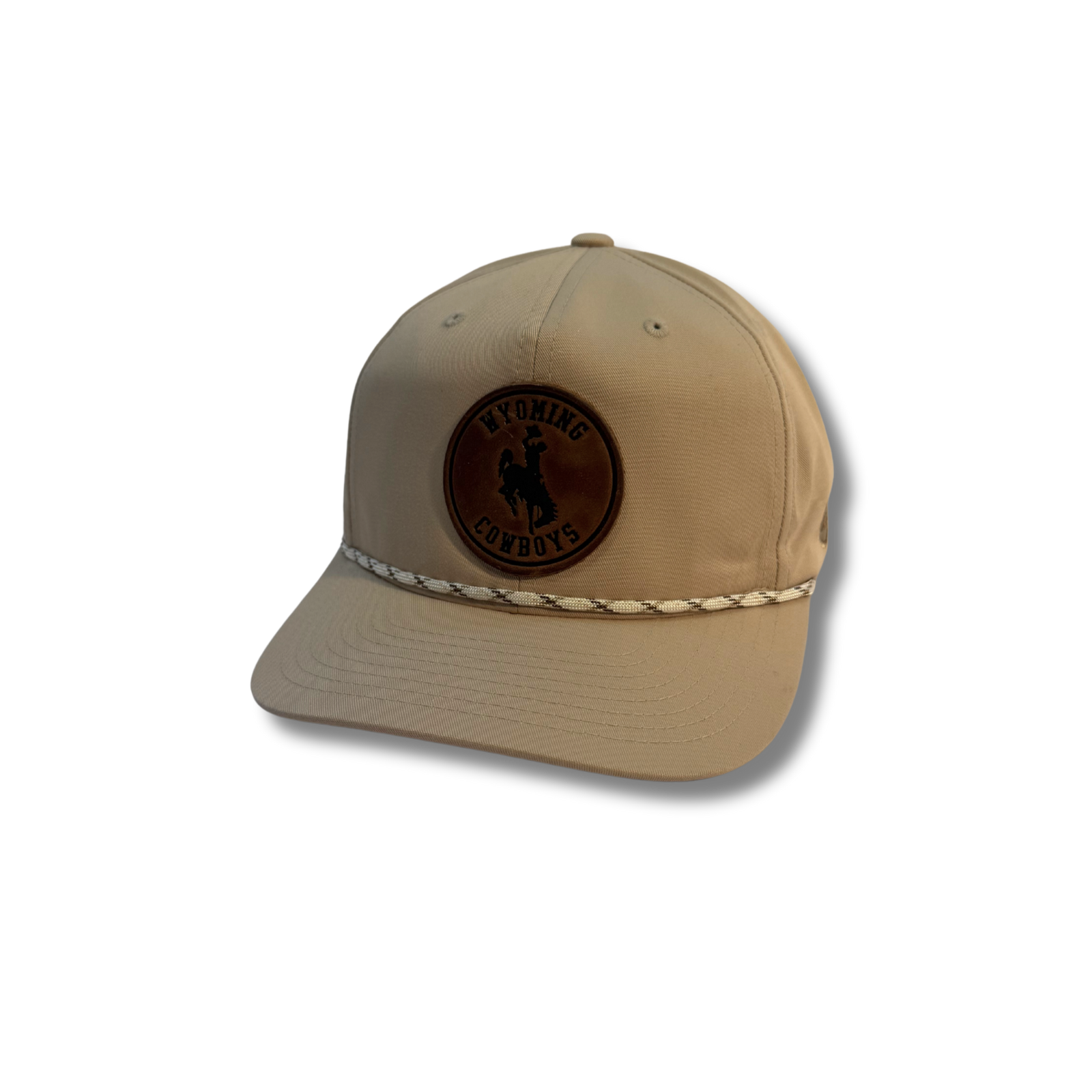 tan adjustable hat with white and brown rope across bill. has circle patch with wyoming cowboys and bucking horse on front panel.