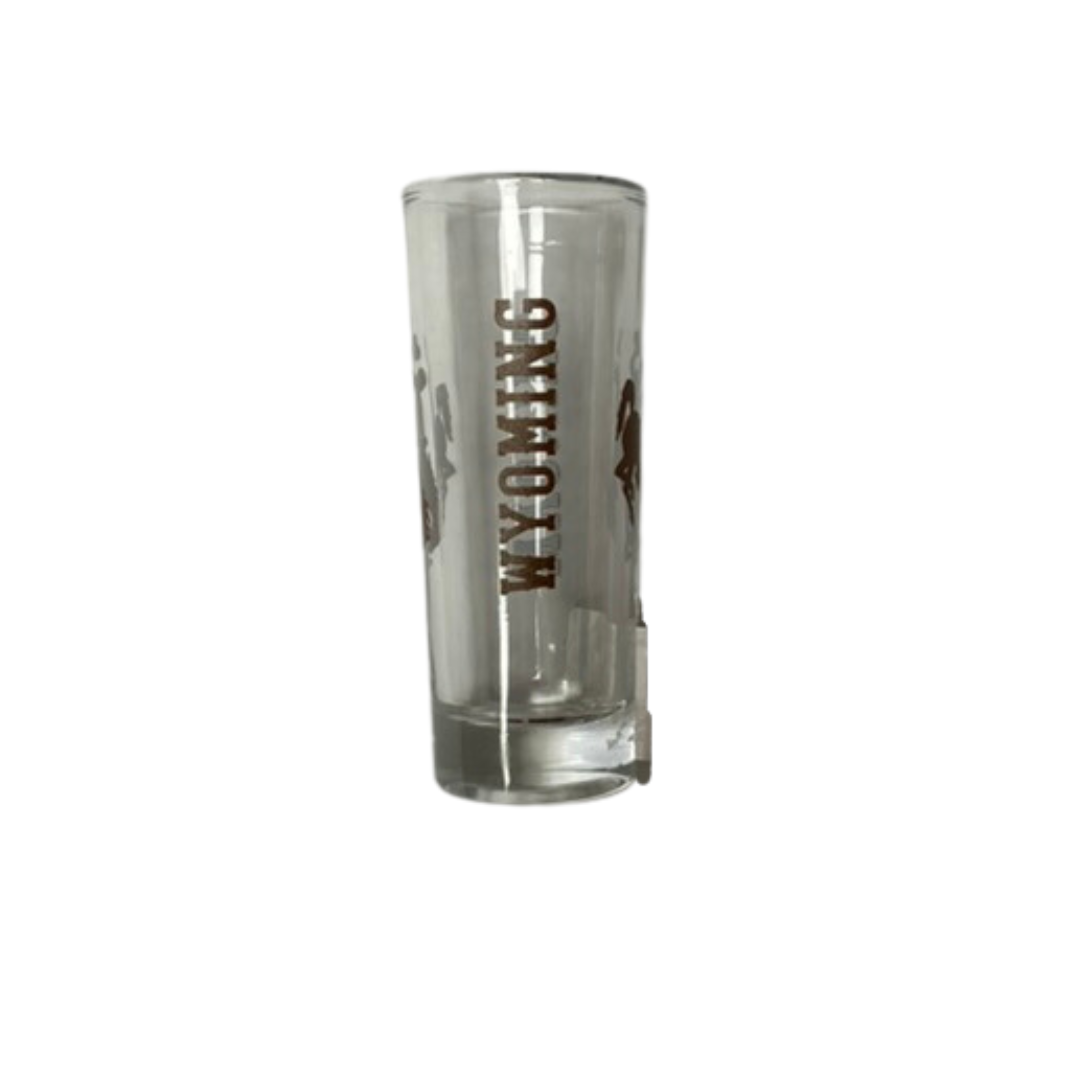 2.5 ounce shot glass, design is vertical brown word Wyoming with brown bucking horse