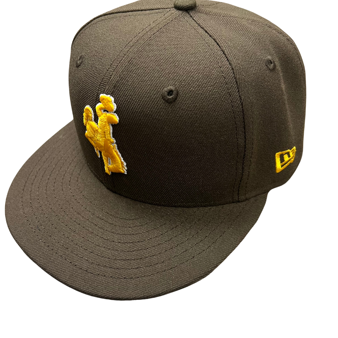 Brown fitted hat, design is gold bucking horse white outline