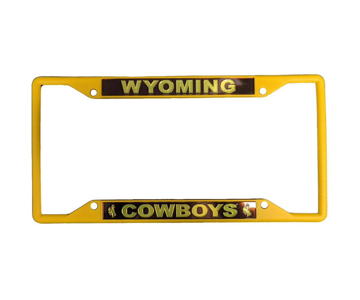 matte gold license plate cover. gold Wyoming boxed in, in brown on top. Gold cowboys boxed in, in brown with gold bucking horse on either side.