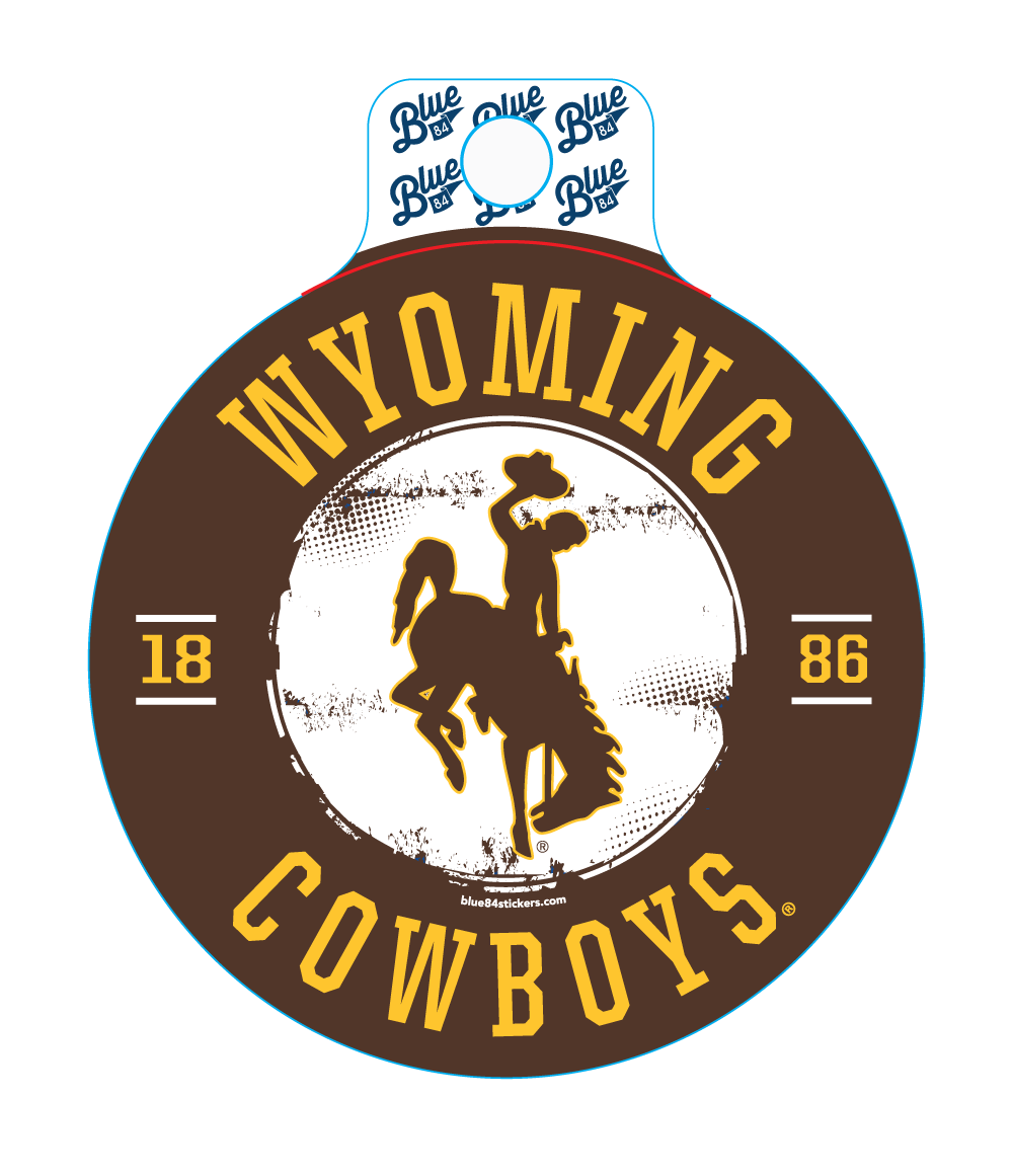circle decal with brown outer circle and white center. at top, wyoming and cowboys at bottom in gold. 1886 and bucking horse in center.