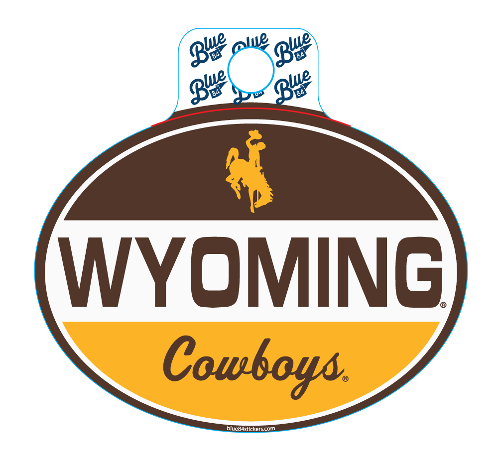 oval decal with brown top white center and gold bottom with Wyoming in brown in center and cowboys in brown at bottom.