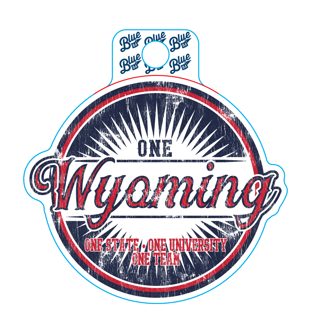 Circle decal with one wyoming in script center in red with blue outline. One state, one university, one team at bottom. Background is red, blue and white