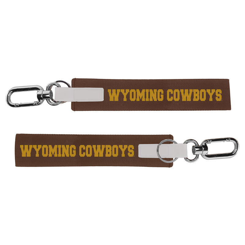 Brown fabric key strap. Gold wyoming cowboys down center. Carabiner attachment