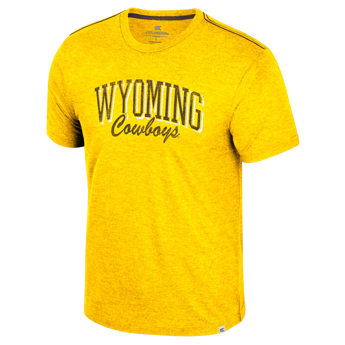 gold short sleeve tee with design center chest. Arced wyoming in brown with white shadow. Script brown Cowboys under