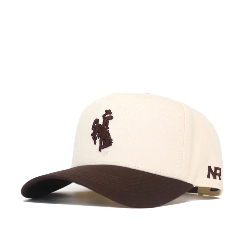 cream adjustable hat with brown brim. has brown bucking horse embroidered on front panel with the nr logo on left side of hat
