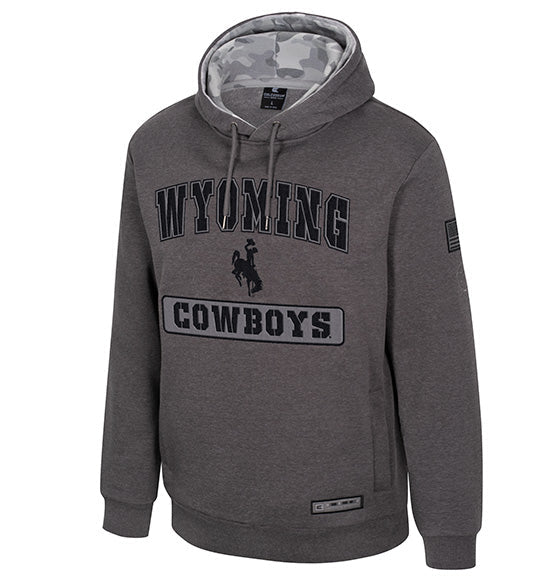Charcoal OHT Hooded sweatshirt with wyoming cowboys and bucking horse logo on front. Has camo in the hood as well as a flag on the left sleeve. Pictured on a white background.