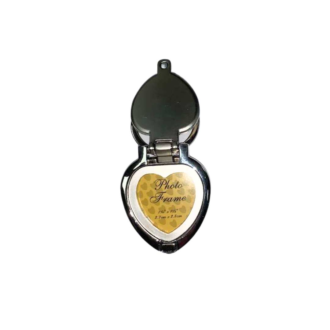 Opened heart shaped silver metal locket keychain