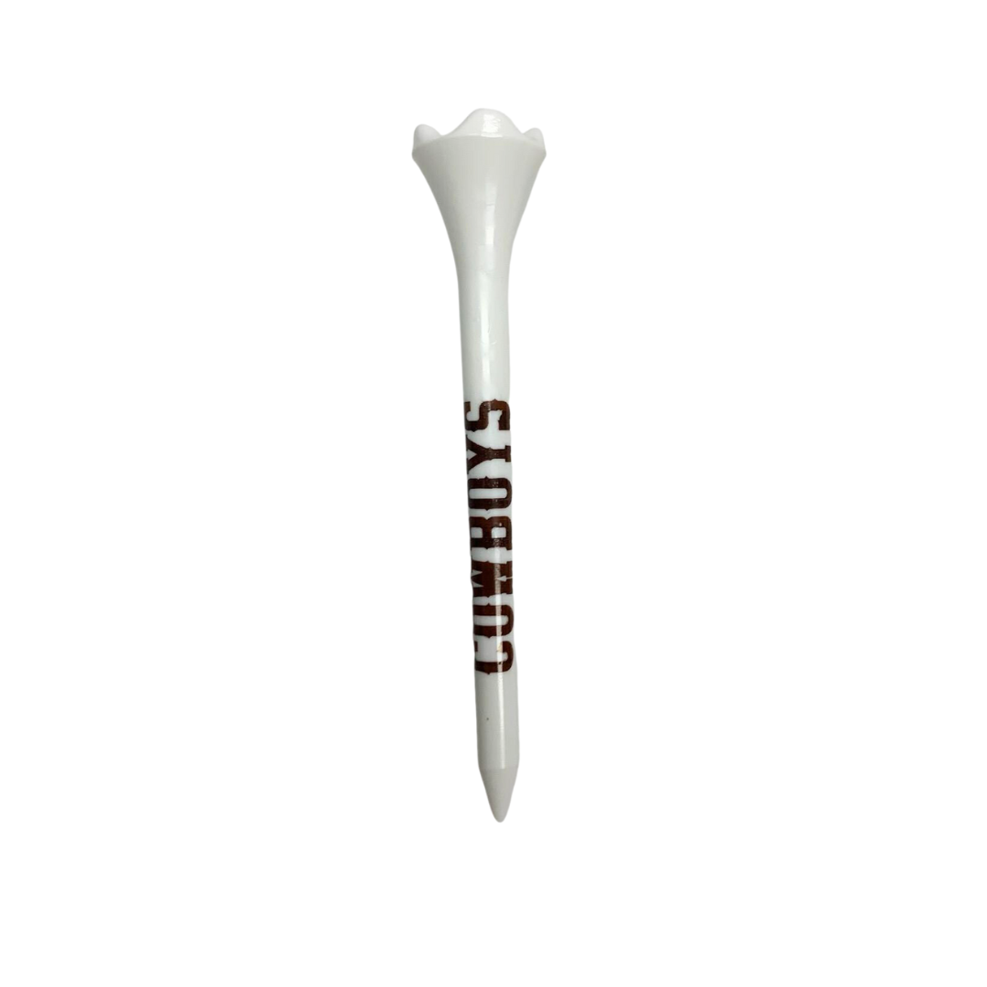 Back of white golf tee, design is brown word cowboys along side of tee