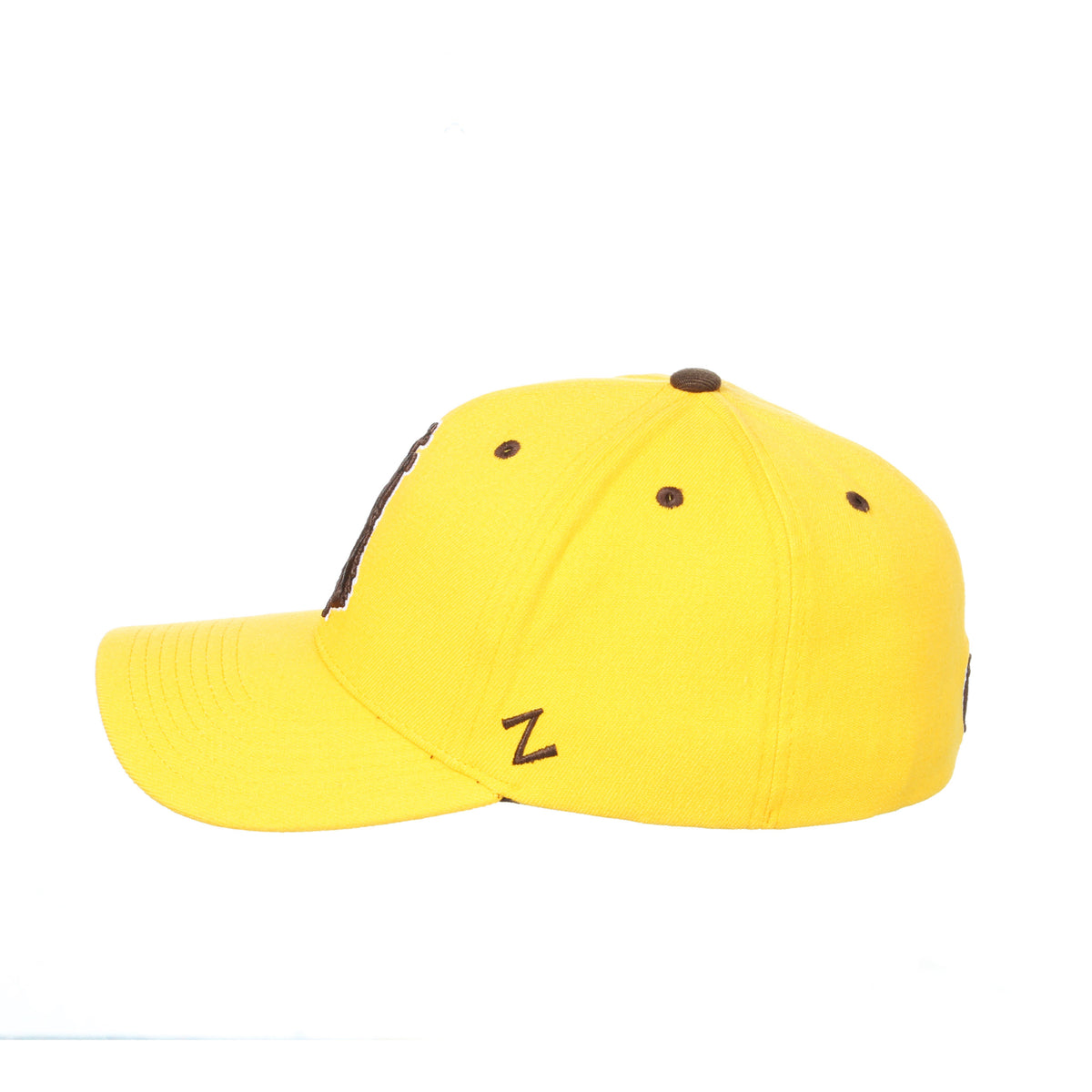 left view of gold, structured flex fit style hat. brown Z logo embroidered on side of hat