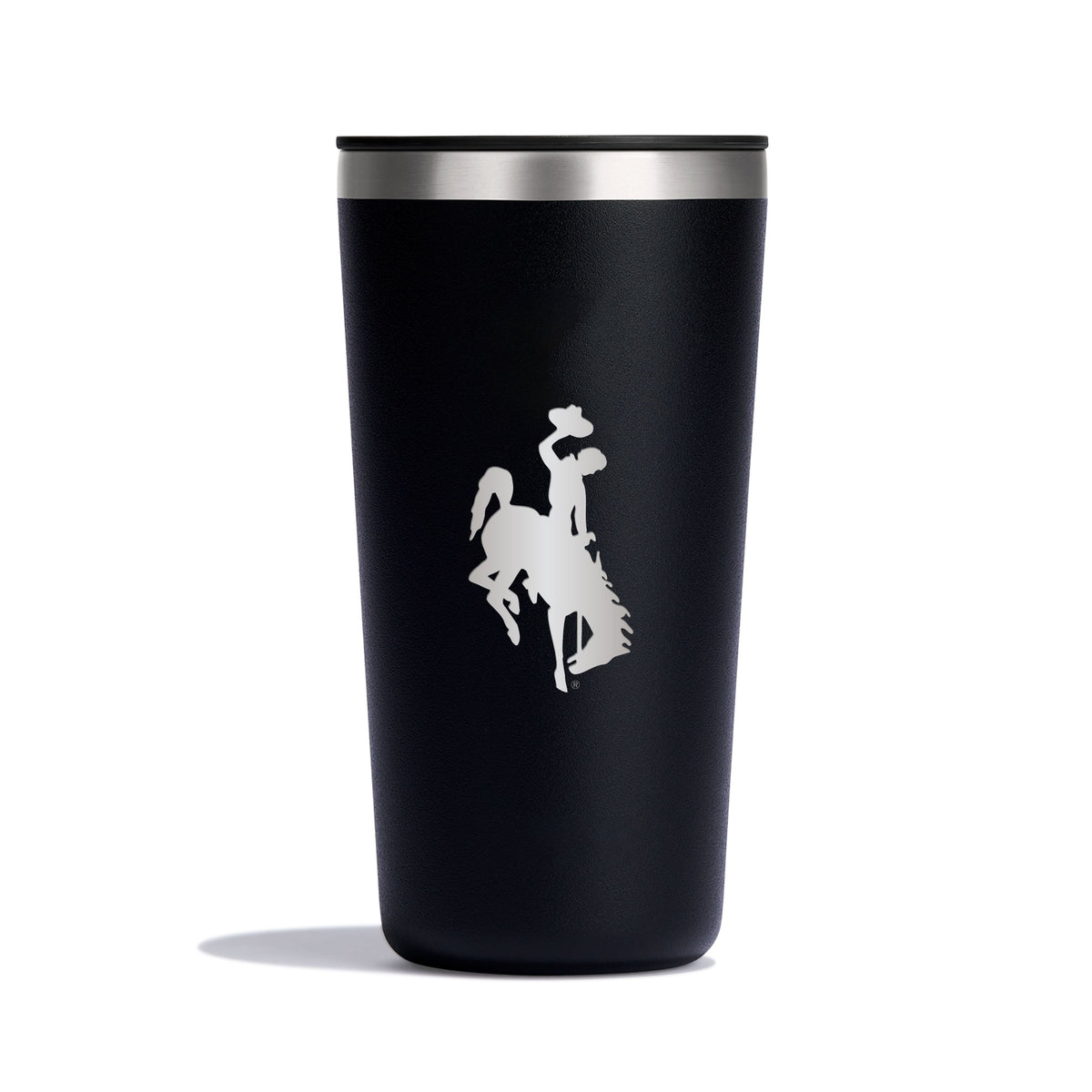 Black tumbler with silver top and an etched bucking horse logo pictured on a white background