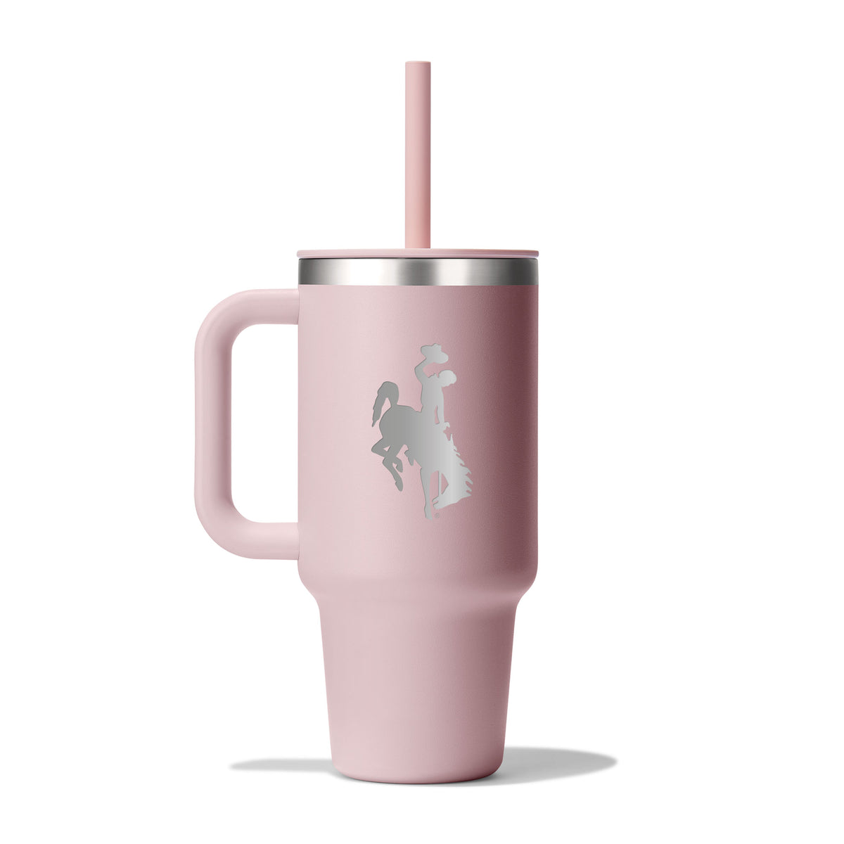 Pink hydro flask tumbler with a straw lid and handle with an etched bucking horse on a white background