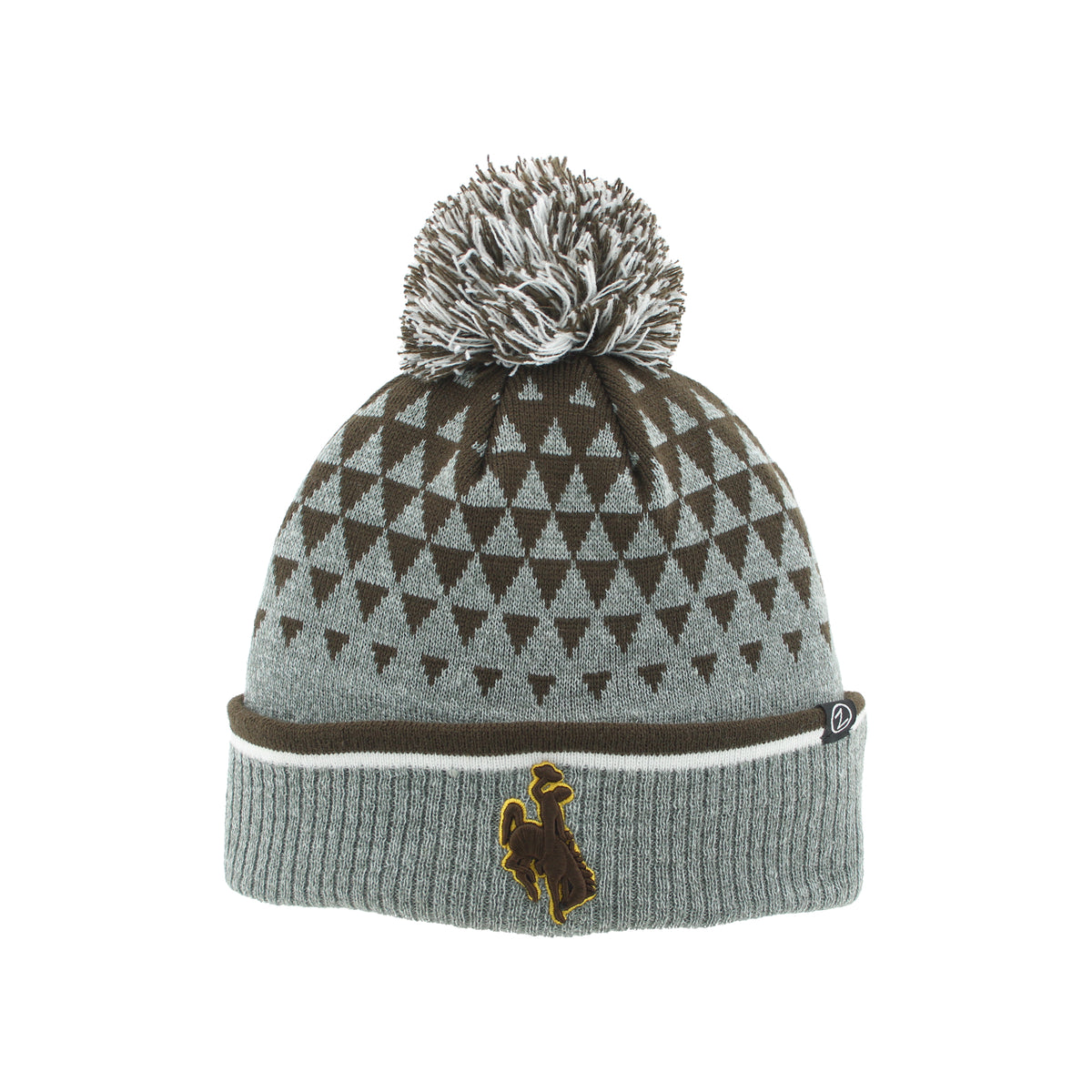 A gray and brown knit pom-pom beanie with a geometric triangle pattern on the crown, a ribbed cuff, and a small bucking horse logo on the front.