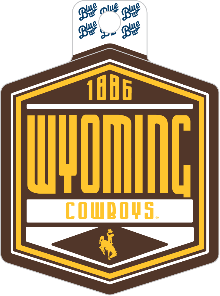 A hexagonal Wyoming Cowboys graphic design with the words '1886 WYOMING COWBOYS' in yellow on a brown and white background, plus a small cowboy silhouette and repeated Blue logo elements at the top.