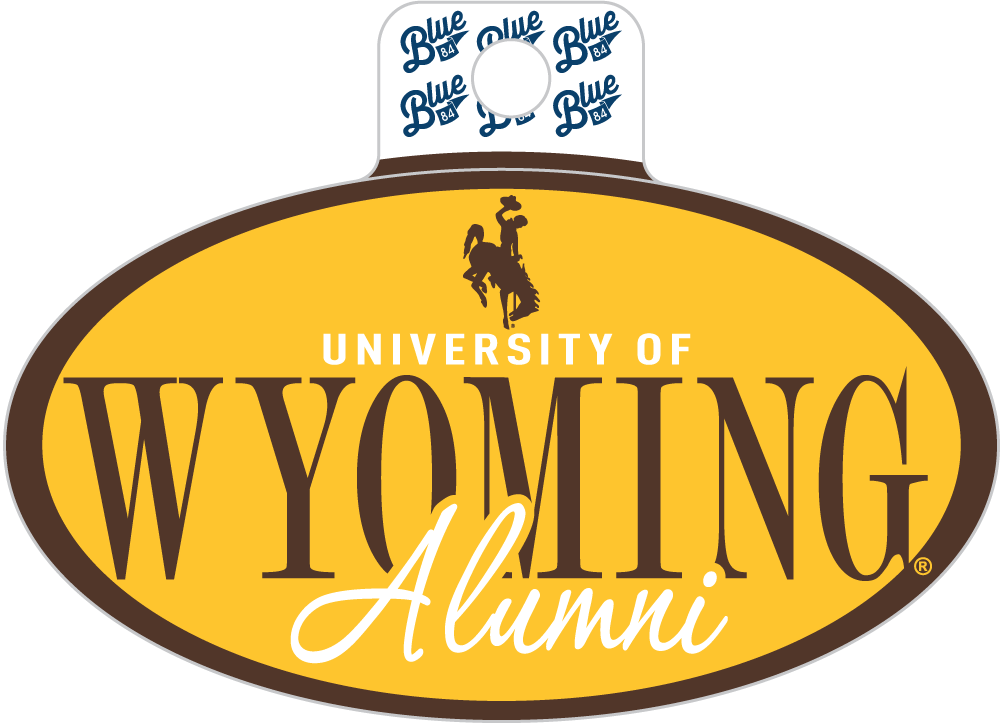 Gold oval decal with 'university of wyoming alumni' and bucking horse on front in brown and white. 