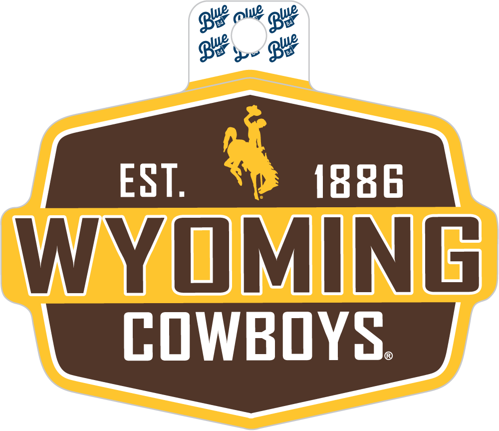 Brown Decal with gold outline. Has gold bucking horse logo with EST 1886 wyoming cowboys on the front. Pictured on a white background.