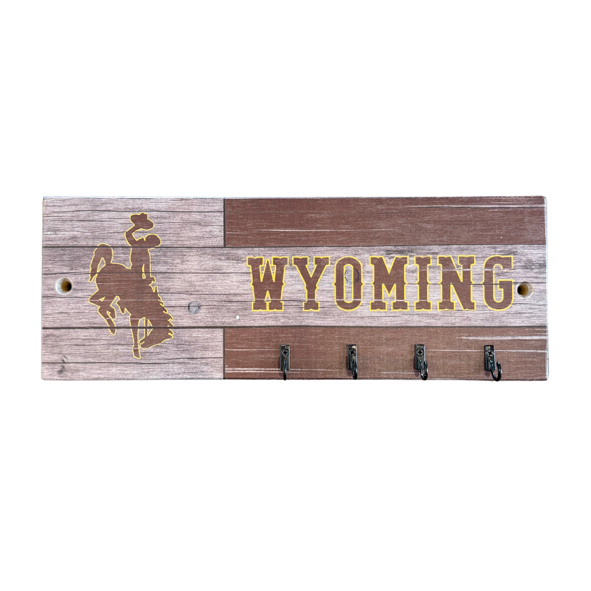 wooden key rack with four metal hooks. has bucking horse wyoming in brown with gold outline for design on the rack