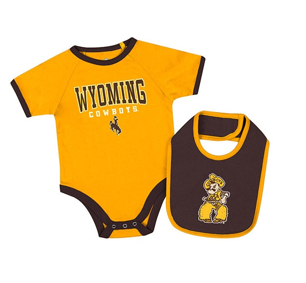 Gold and brown bucking horse onesie with bib. Has wyoming cowboys on onesie with bucking horse logo and pistol pete logo on bib. All pictured on a white background.