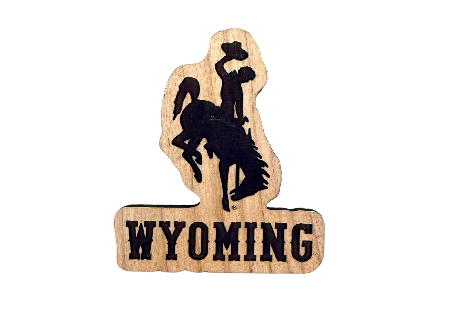 Wooden magnet with silhouette of a cowboy on a horse and 'Wyoming' text engraved 