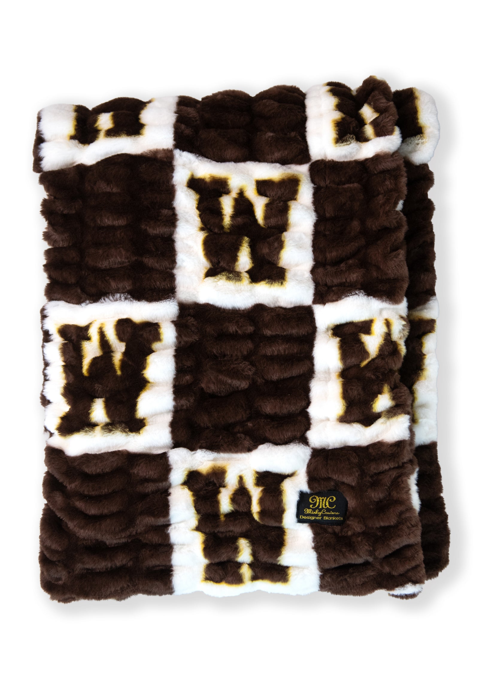 Brown and white checkered blanket with W logo in white squares.