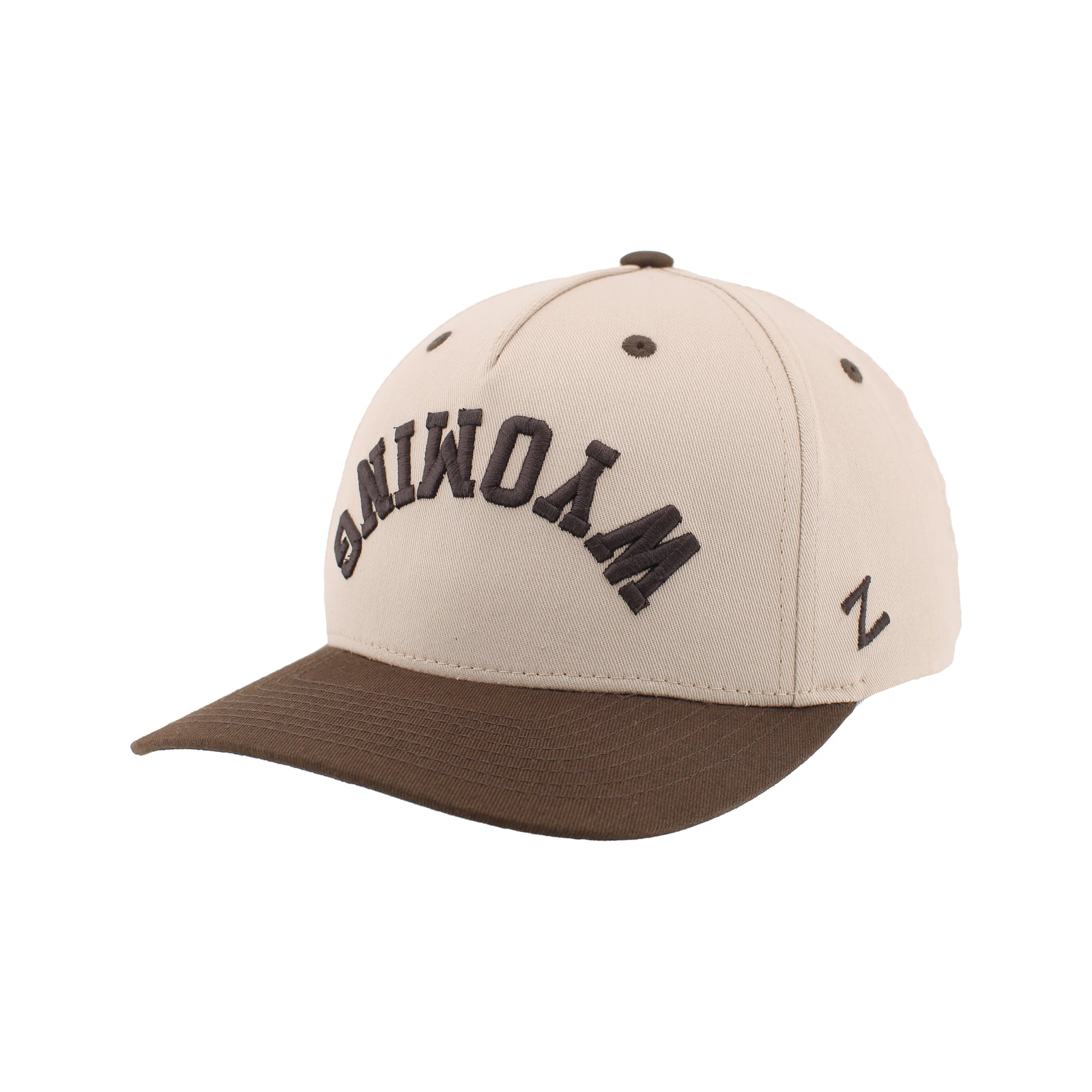 Cream hat with brown bill. Has brown Wyoming lettering embroidered upside down on front.