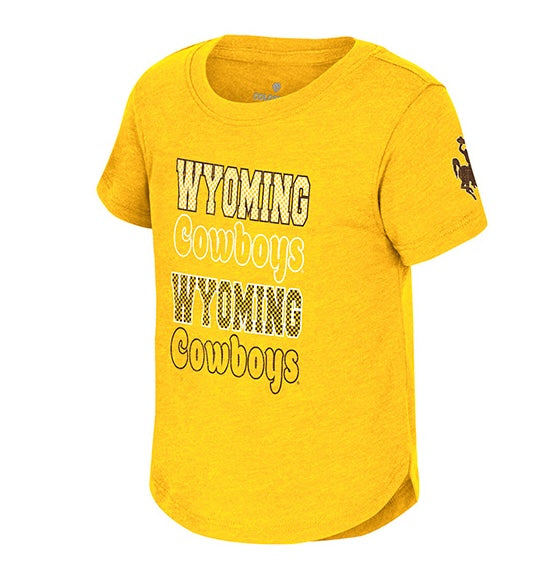 Gold girls short sleeve tee with bucking horse on left sleeve. Has wyoming cowboys repeated on the front in different designs and fonts. All pictured on a white background.