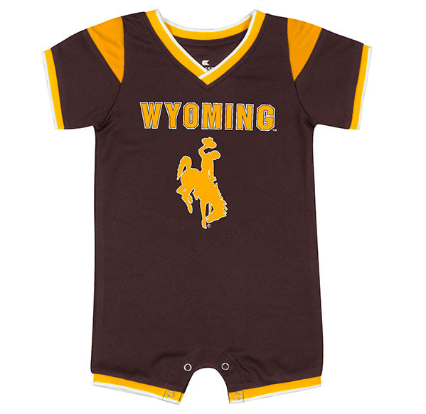 A baby short-sleeve romper in dark brown with yellow and white trim, featuring 'WYOMING' and a bucking horse graphic on the front, displayed against a plain white background.