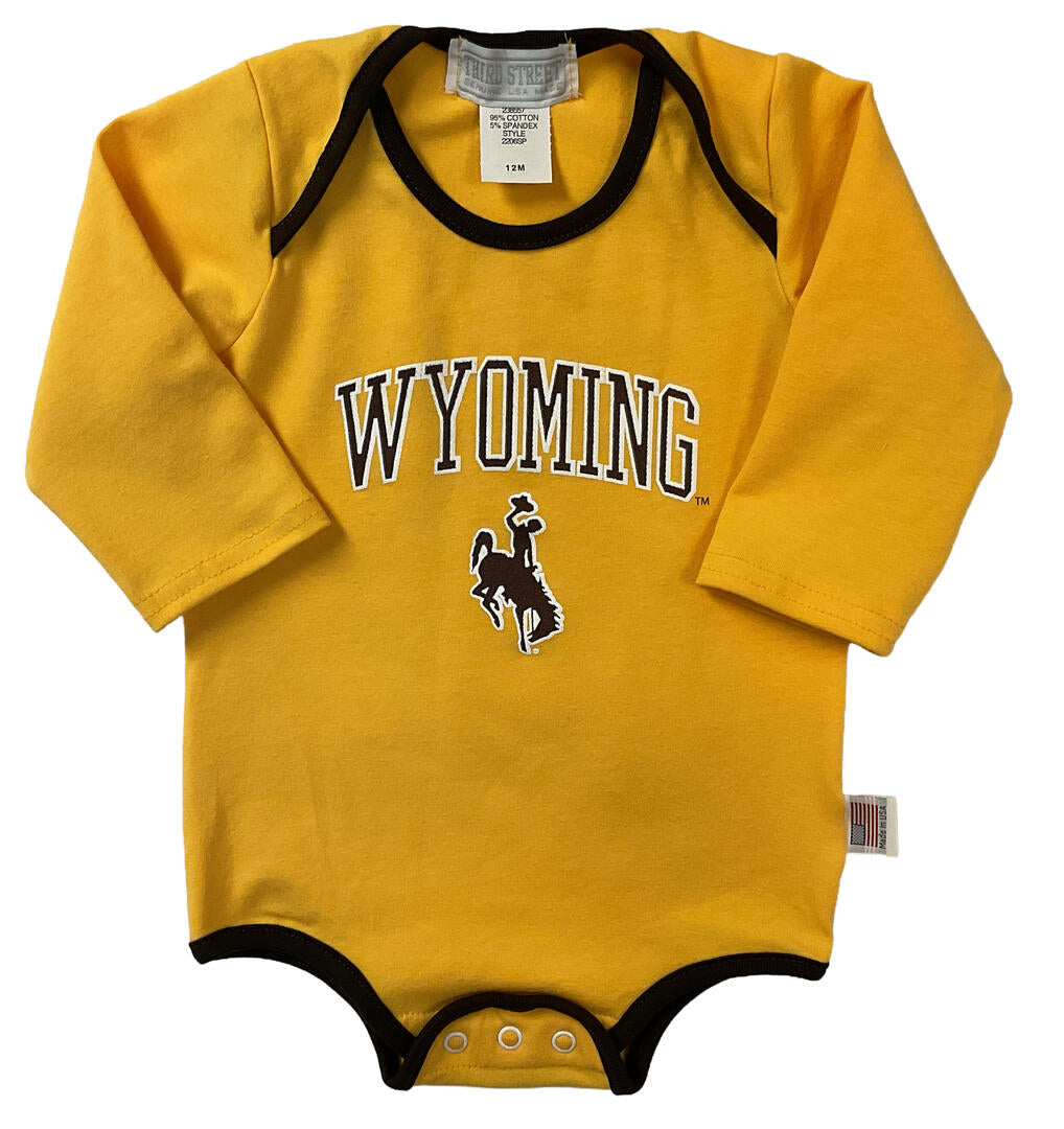 Yellow baby onesie with 'Wyoming' and bucking horse logo on the front.