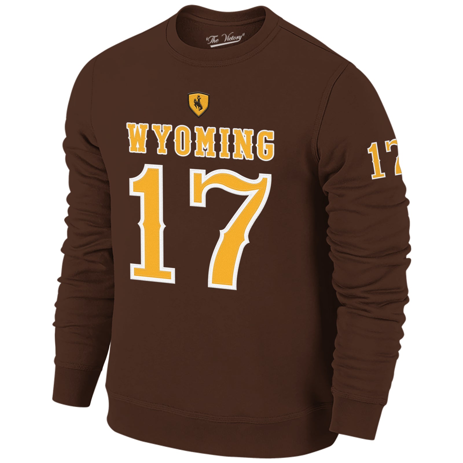 Brown crewneck pictured on a white background. Has Wyoming lettering with 17 below. Gives a jersey look. Has small 17 patch on the left sleeve.