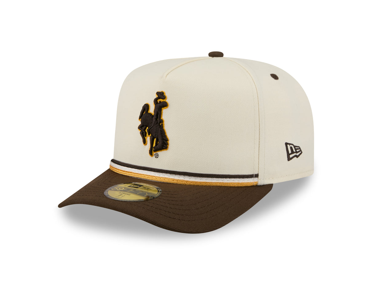 A structured baseball cap featuring an off-white crown with a brown and gold bucking horse logo on the front, a dark brown flat brim with a thin white stripe.