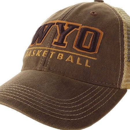 A brown trucker-style baseball cap with 'WYO BASKETBALL' embroidered on the front. The cap features a brown canvas front and brim, a tan mesh back, and dark brown and gold embroidered lettering.