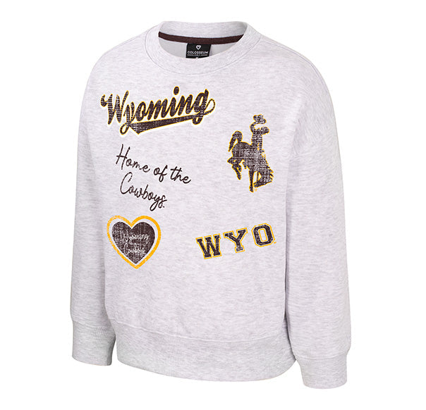 A light heather gray crewneck sweatshirt featuring 'Wyoming' and 'Home of the Cowboys' text, a cowboy graphic, and a heart patch with 'WYO' printed inside, shown on a plain white background.