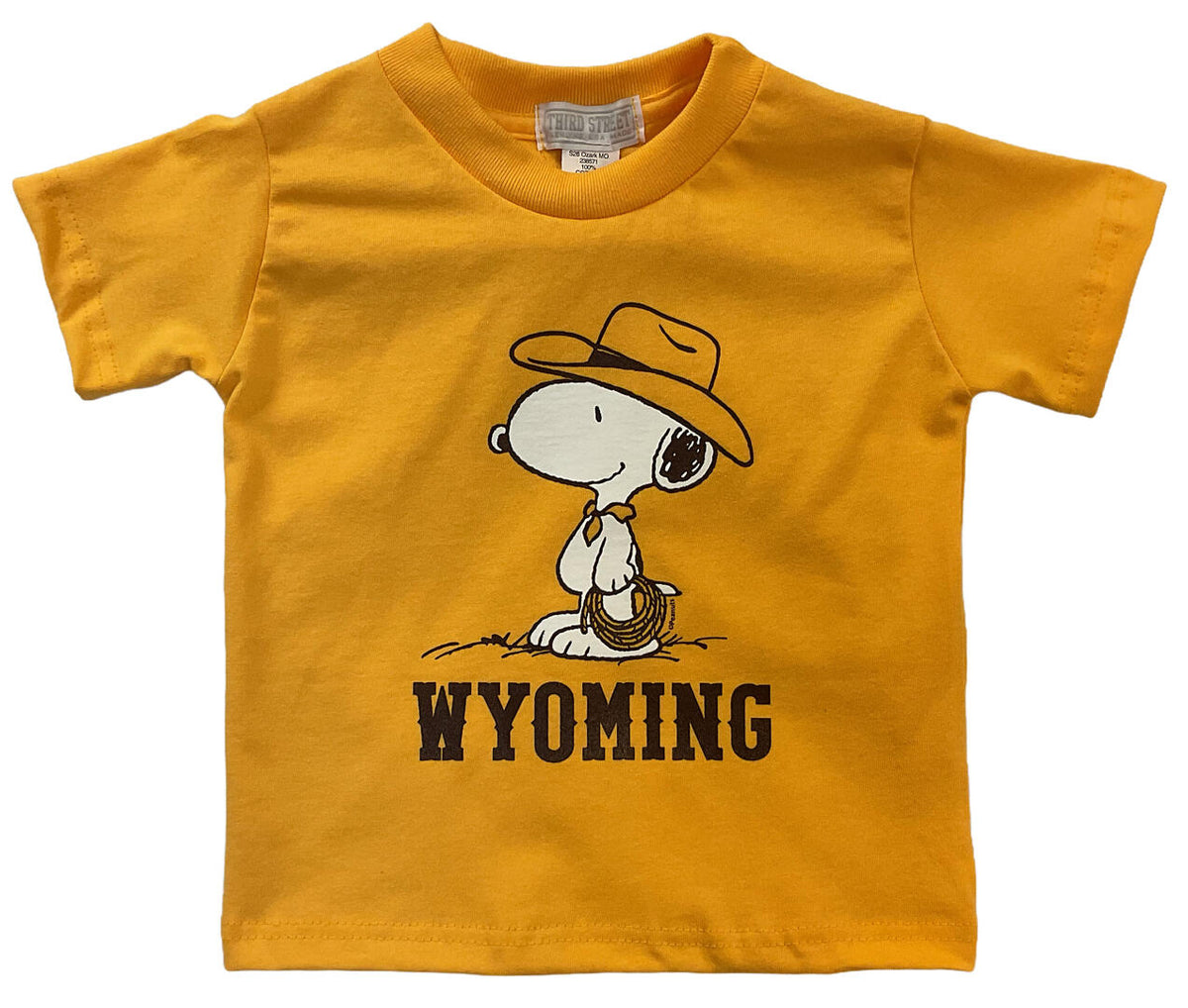Gold toddler t-shirt with a snoopy character wearing a hat and boots, and 'Wyoming' text on a white background