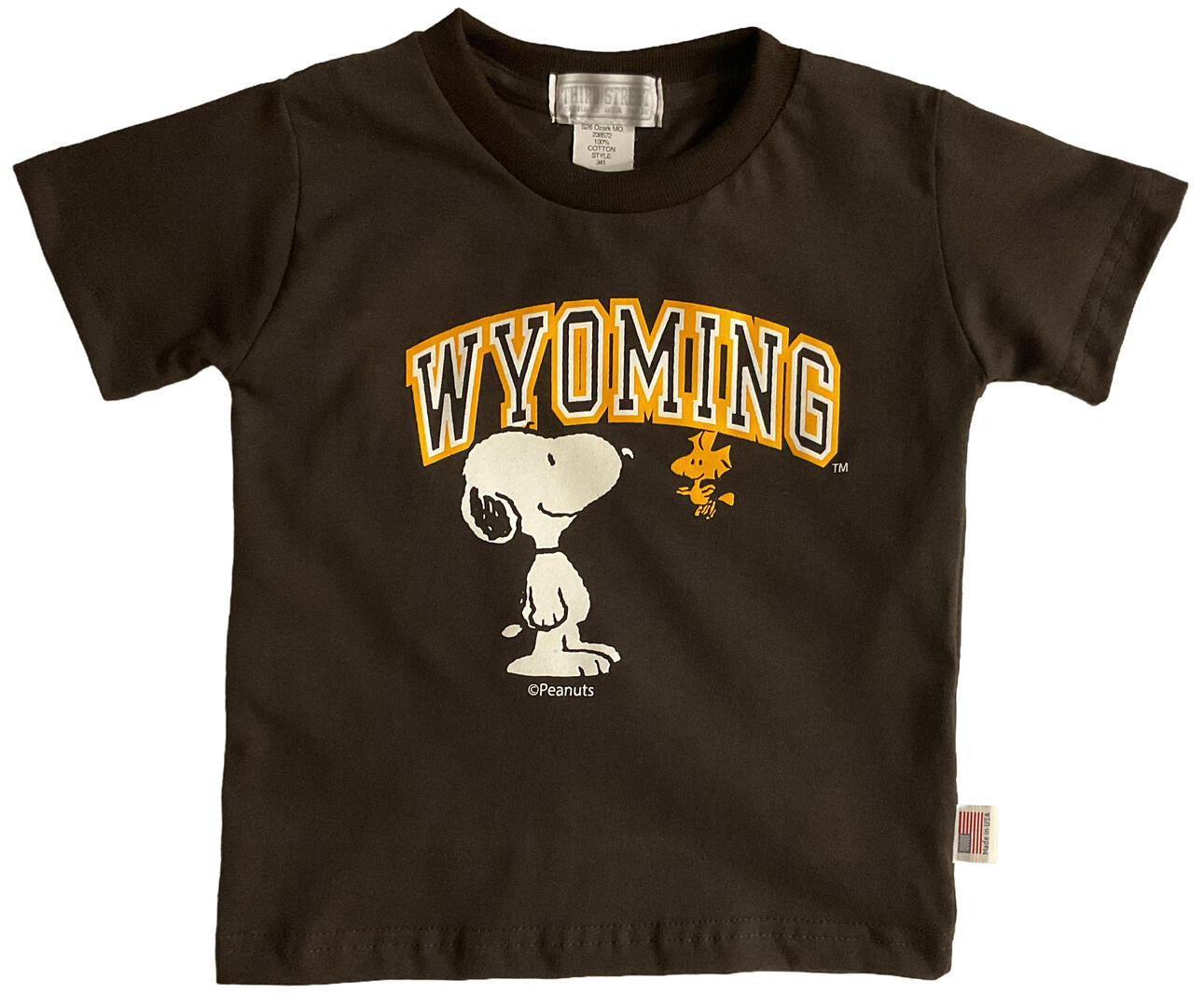brown toddler tee shirt with and white design on front. design is 'wyoming' with snoopy underneath.