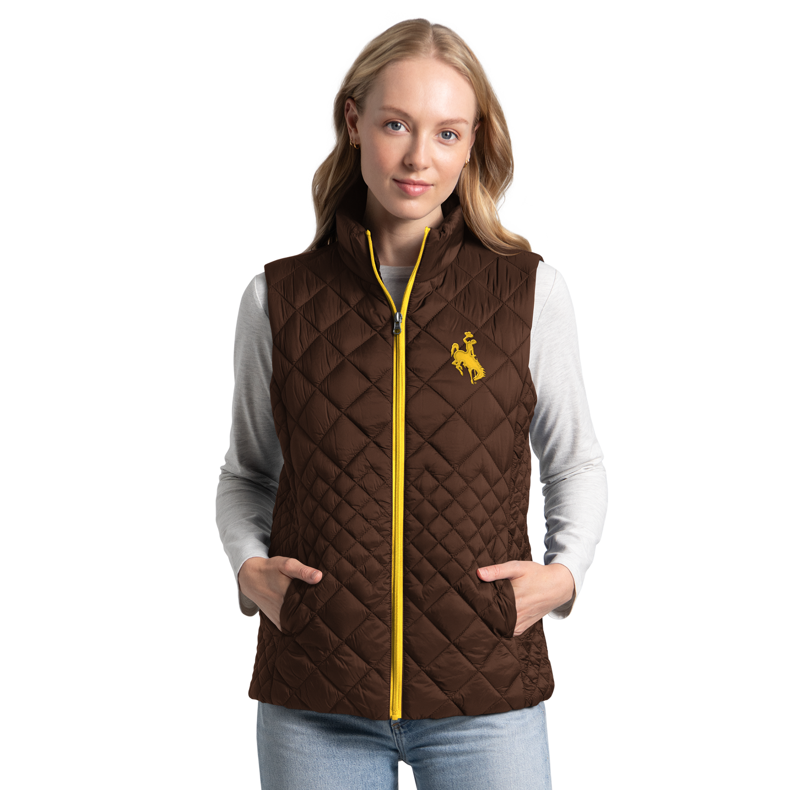 Women modeling a brown vest that has a gold zipper. Has gold bucking horse logo on left chest