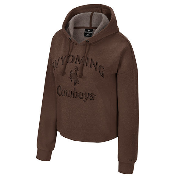 A cropped brown hoodie sweatshirt featuring 'WYOMING Cowboys' text and a cowboy logo printed in brown across the chest, shown against a plain white background.