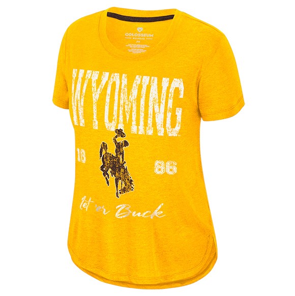 A women's short-sleeve t-shirt in a heathered gold color, featuring a distressed white 'WYOMING' text graphic and a brown bucking horse logo on the front.