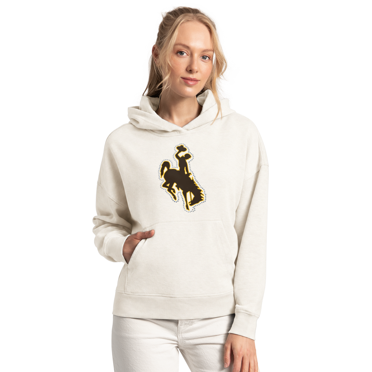 Woman modeling an ivory white sweatshirt with brown bucking horse logo on front with rhinestone outline. Pictured on a white background.