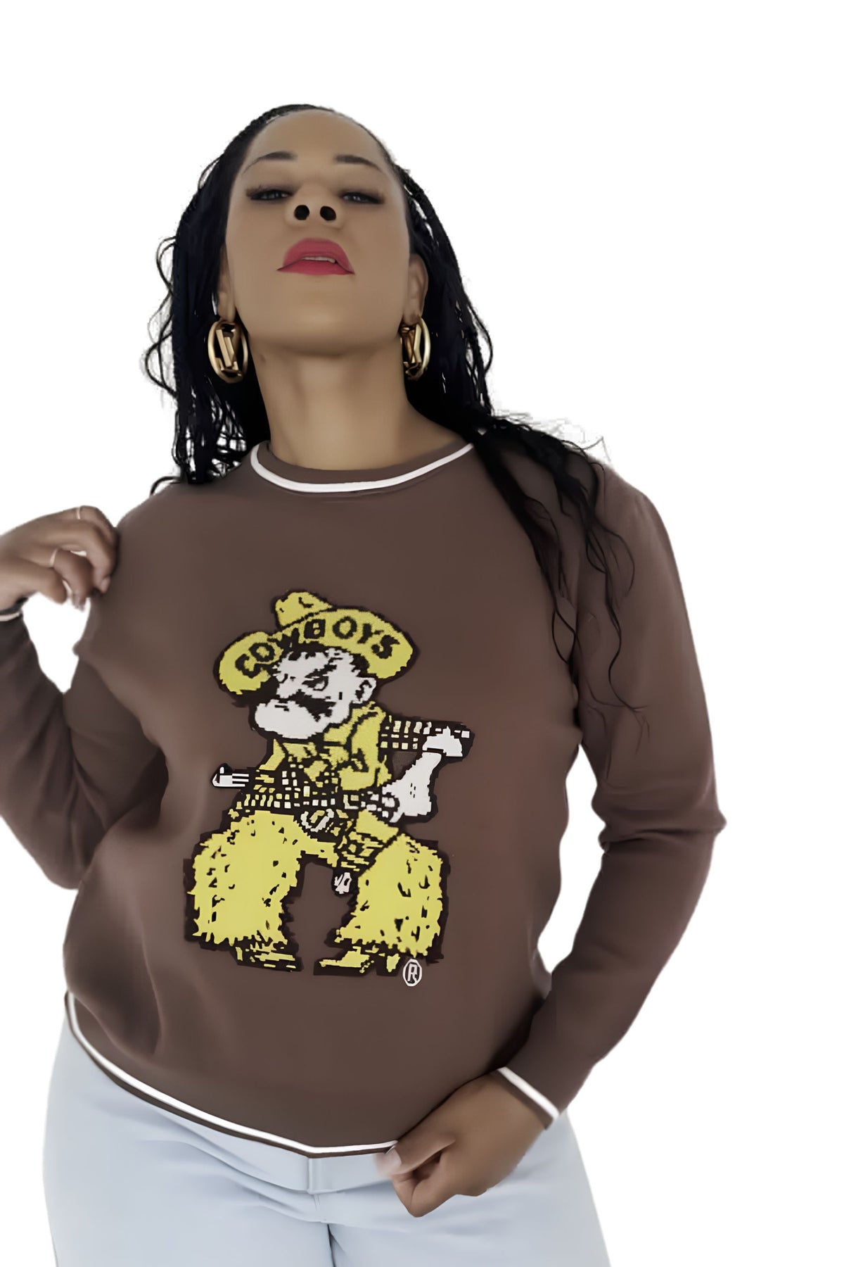 Woman wearing brown sweater with pistol pete logo on chest. Pictured on a white background.