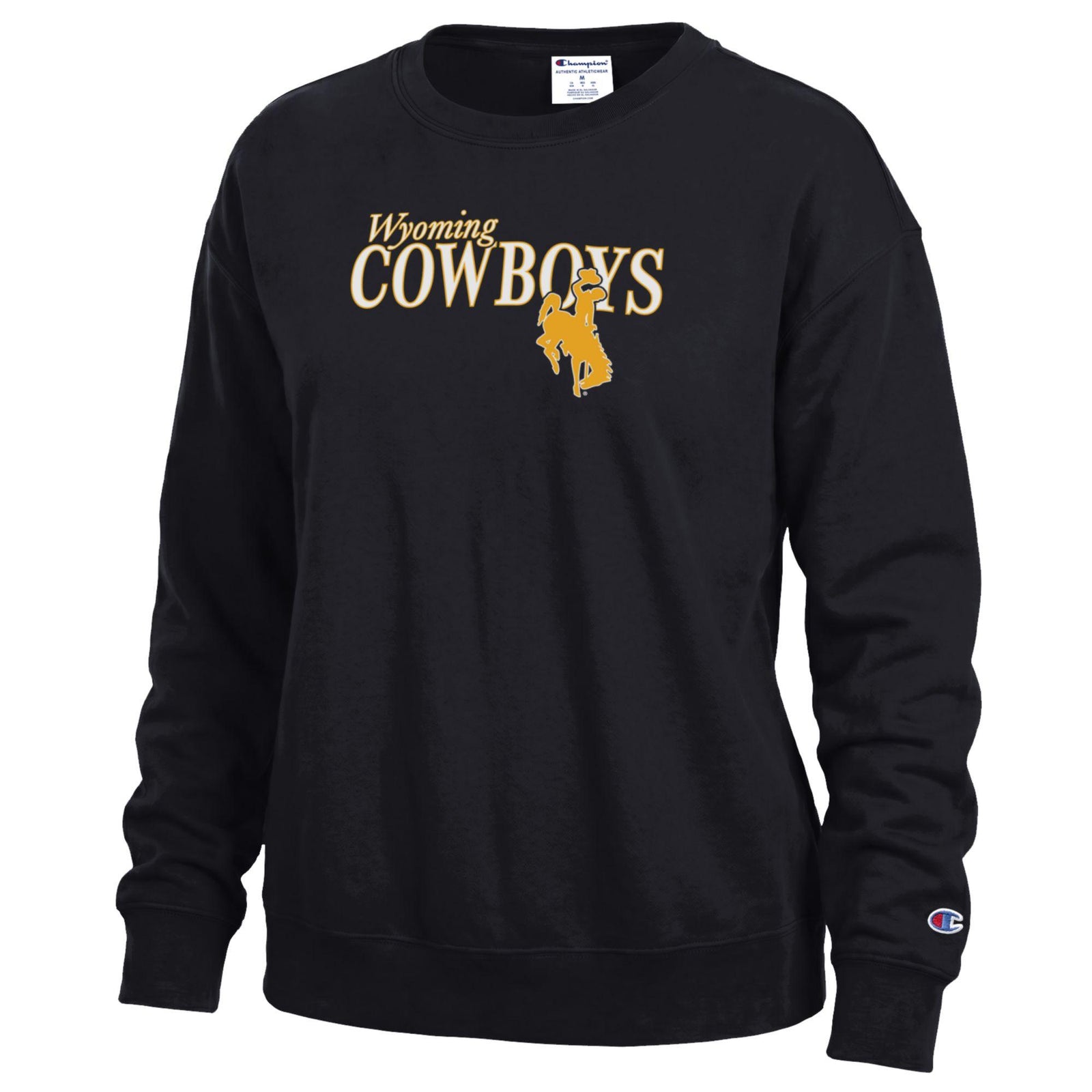 A black long-sleeve crewneck sweatshirt featuring a gold 'Wyoming COWBOYS' graphic with a bucking horse silhouette on the chest, and a small Champion logo on the left sleeve cuff.