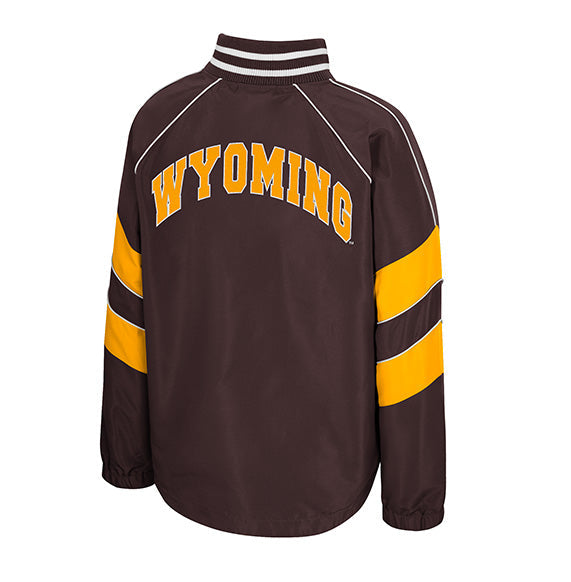 A dark brown athletic jacket with 'WYOMING' printed in yellow arched letters on the back, featuring yellow and white stripes on the sleeves, shown against a plain white background.