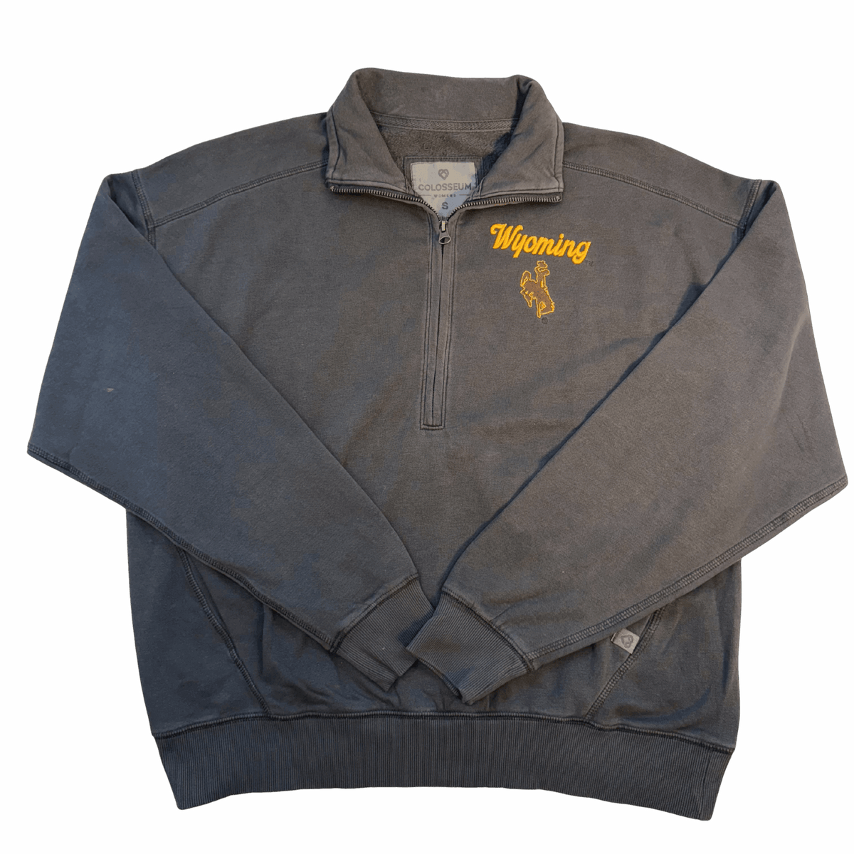 women's charcoal quarter zip jacket with pocket on the front. has embroidered script wyoming in gold with brown bucking horse below on the left chest