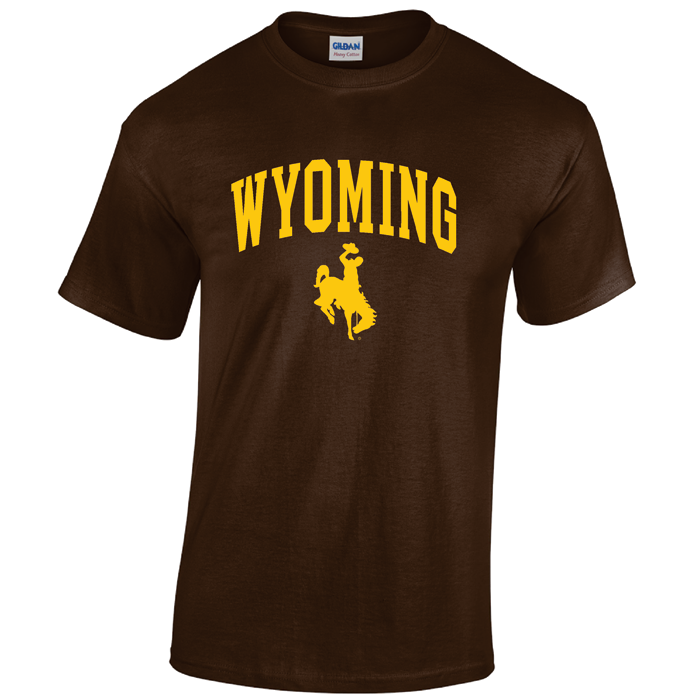 brown short sleeved t-shirt with design on front, design is the word Wyoming arced, with bucking horse below. both printed in gold