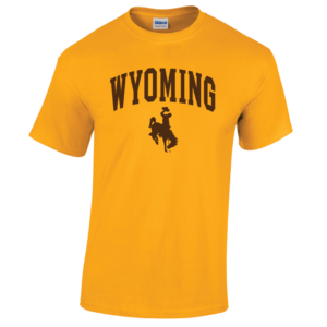 gold short sleeved t-shirt with design on front, design is the word Wyoming arced, with bucking horse below. design printed in brown