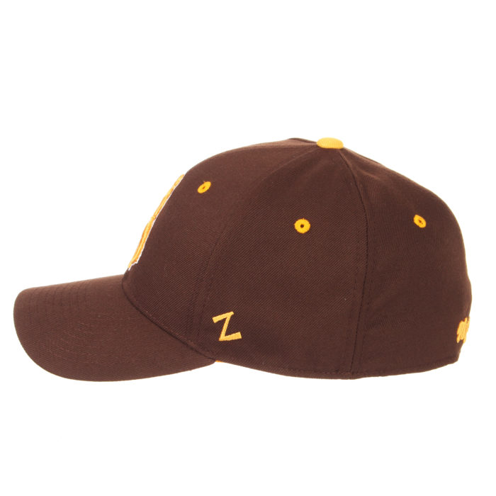 side view of brown fitted hat with gold eyelets and embroidered Z logo on the side of hat