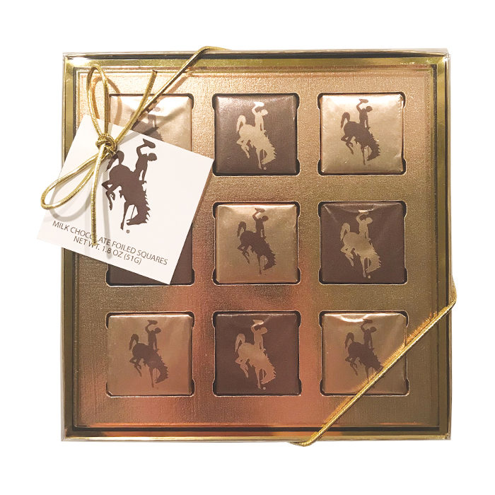 Wyoming cowboys 9 piece chocolate gift box, box is clear with gold ribbon and white card, chocolates individually wrapped in gold or brown foil with bucking horse on outside