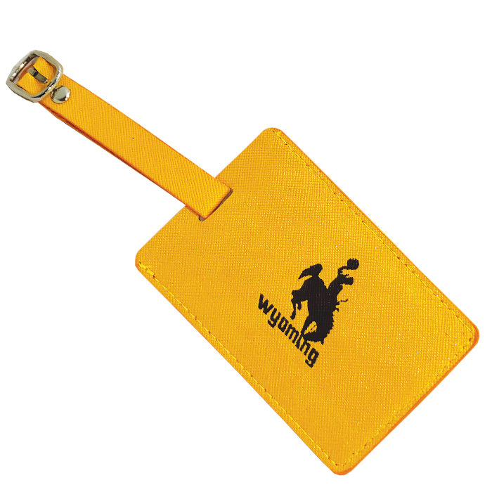 front side of gold luggage tag. Word Wyoming and bucking horse printed on front in brown.