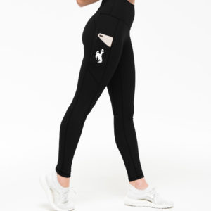model wearing black athletic leggings. pocket on side with white bucking horse printed in center of pocket