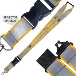 grey, 1 inch wide lanyard. Includes slogan University of Wyoming printed down lanyard in gold and plastic buckle with detachable key ring