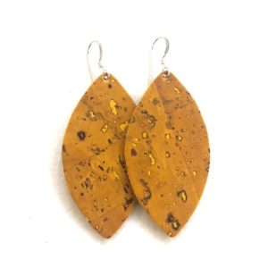 eye shaped leather earrings. gold cork material with gold specks inside. silver jewelry hardware